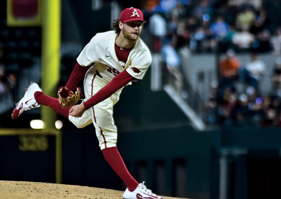 Hunter Hollan pitches to Oklahoma State in the final game of the College Baseball Showdown at Globe Life Field in Arlington, Texas.